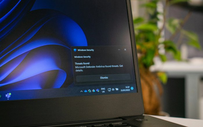 Shield icon over a website interface